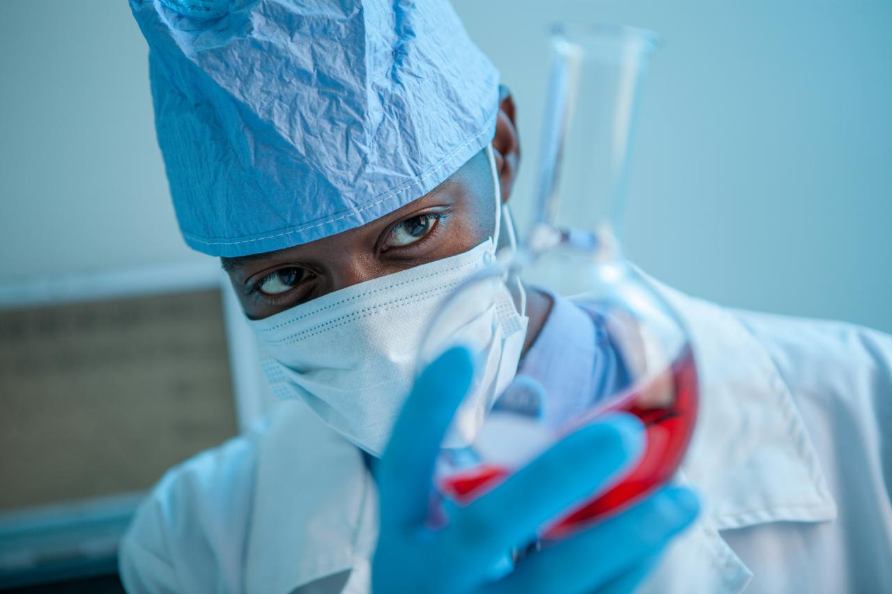 A doctor performing a preventive care check-up on a patient